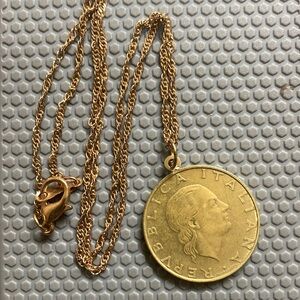 Italian coin with 14k gold bale connected